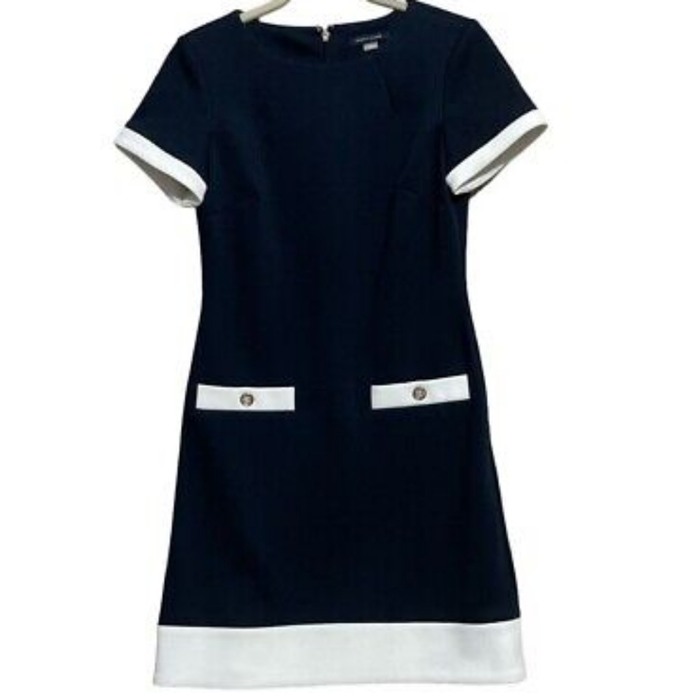 Elegant Black Dress with White Accents Preowned But In Exelent Condition..